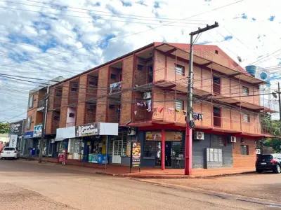 Bloco de apartamentos e lojas comerciais à venda em Obligado