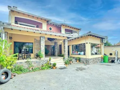 Casa à venda em Lambaré, bairro Kennedy | 600 m²