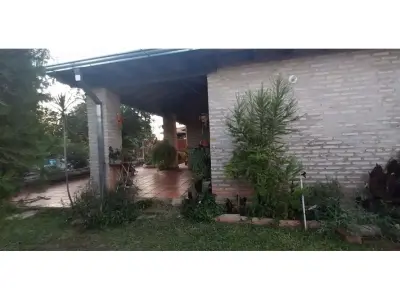 Casa à venda em Ñemby, bairro Cañadita, com 4 dormitórios