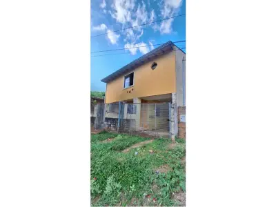Casa à venda em Villa Elisa, bairro Mbocajaty