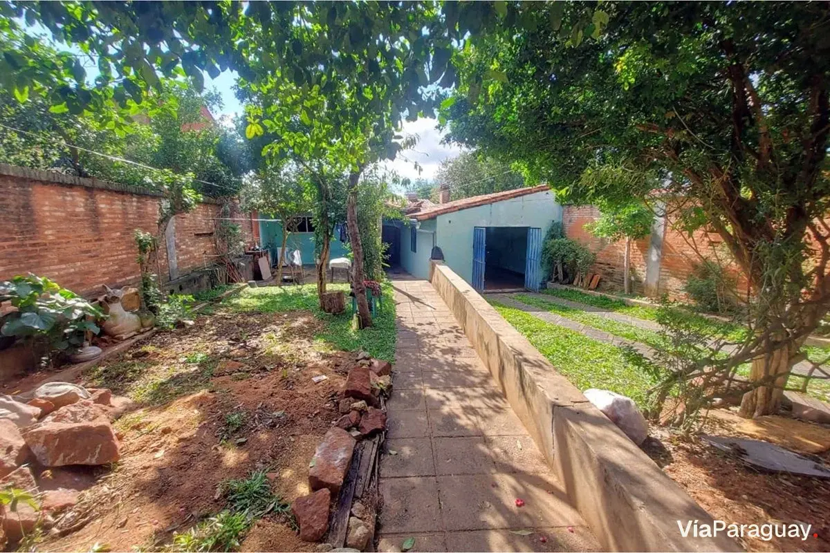 Casa à venda em Villa Elisa, bairro Mbocayaty, 4 quartos