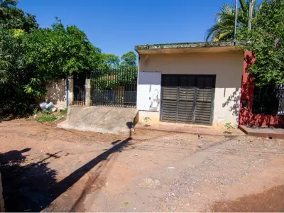Casa à venda em Villa Elisa com jardim e salão comercial