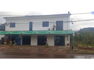 Salão comercial e apartamento para alugar em San Lorenzo