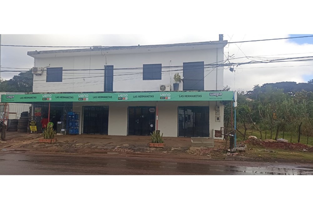 Salão comercial e apartamento para alugar em San Lorenzo
