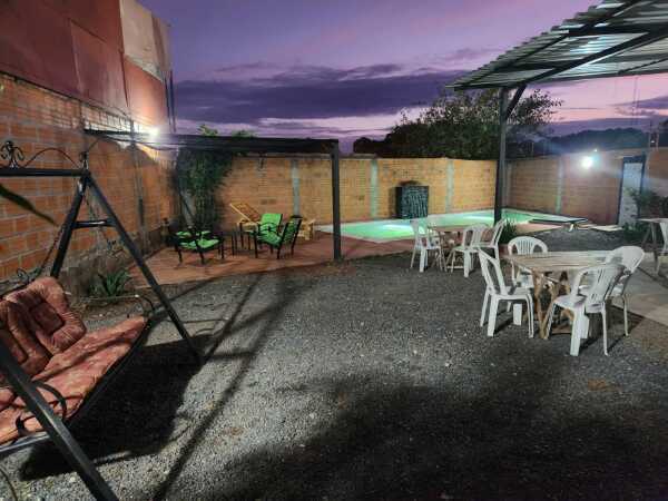 Terreno amurallado con piscina y quincho en Villa Elisa