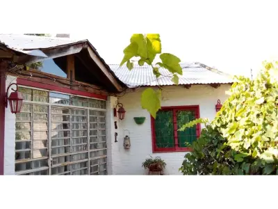 Terreno con 2 casas en venta en Capiatá, Puerta del Sol