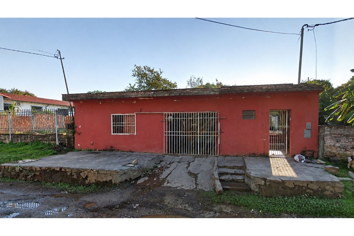 Terreno com casa à venda em Mariano Roque Alonso