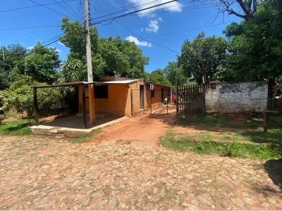 Terreno com casa à venda em San Antonio, Lambaré