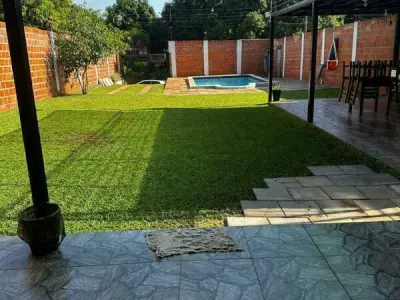 Terreno com quinchos e piscina à venda em Capiatá