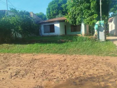 Land for sale with house in Itauguá, Cañadita