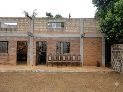 Terreno à venda com construção em Guazú Virá, Itauguá