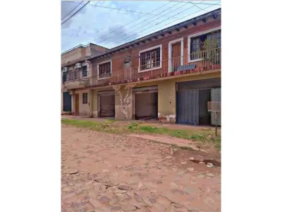 Terreno à venda com construção para demolir em Lambaré