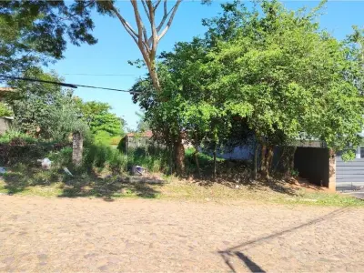 Terreno à venda de 720 m² em Villa Elisa, bairro 8 de Diciembre