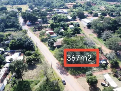 Terreno à venda em esquina sobre asfalto em Capiatá
