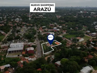 Terreno à venda em Loma Merlo, Luque: 2.104 m² com piscina e frente asfaltada