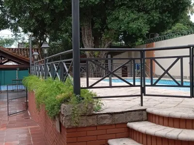 Casa com apartamentos e lojas comerciais à venda, Assunção 4