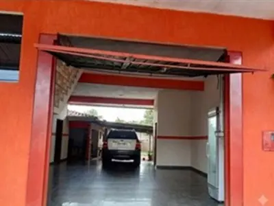 Casa com salão comercial à venda em Capiatá 3