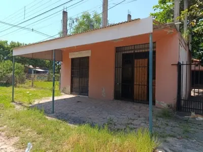 Casa con salones comerciales en venta — San Antonio, Limpio 2