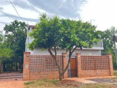 Casa de dois pavimentos com churrasqueira em Capiatá, Barrio Cañada 3