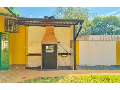 Casa en alquiler en Mora Kue, Luque, con jardín y quincho 3