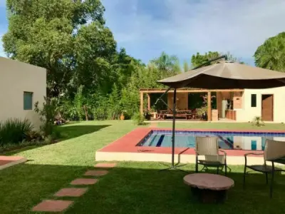 Casa em condomínio fechado em Ypacará — 670 m² construídos com piscina 3