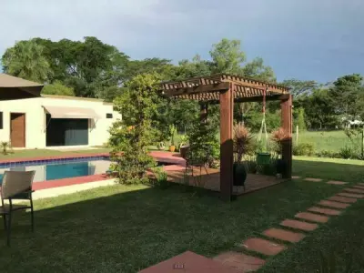 Casa em condomínio fechado em Ypacará — 670 m² construídos com piscina 4
