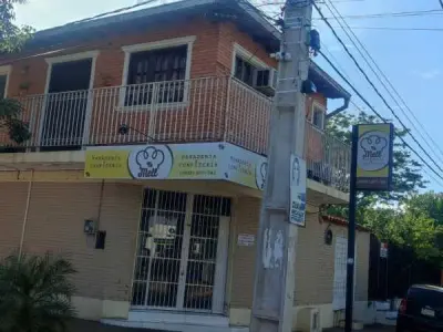 Casa em esquina com salão comercial em Villa Elisa — 280 m² 2