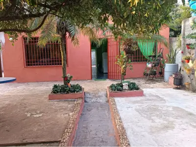 Casa en venta con local comercial en Ñemby, Barrio Rincón 4