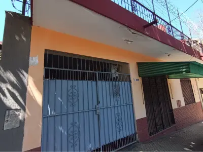Casa à venda com salão comercial no Barrio Jara 2