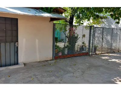 Casa en venta con salón comercial en San Lorenzo 3