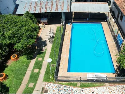 Casa à venda em Caacupé com 6 dormitórios e piscina 2