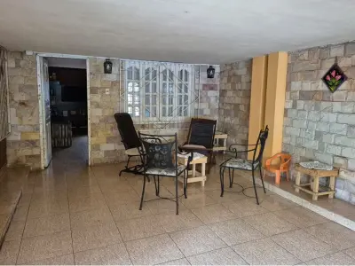 Casa en venta en Itauguá con 4 dormitorios 2