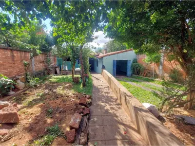 Casa à venda em Villa Elisa, bairro Mbocayaty, 4 quartos 2