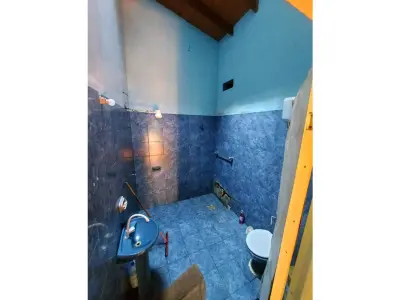 Casa à venda em Villa Elisa, bairro Mbocayaty, 4 quartos 3
