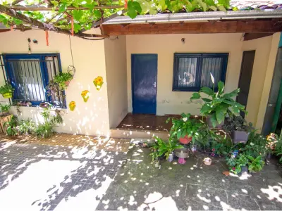Casa à venda em Villa Elisa com jardim e salão comercial 4