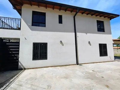 Brand-new 3-bedroom house for sale in downtown Limpio — two stories and a large yard