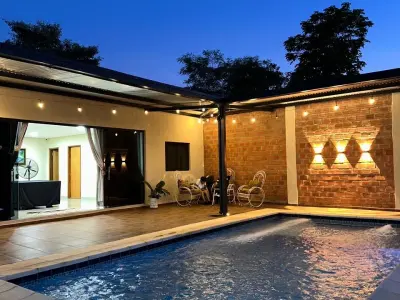 Casa de campo com piscina e área gourmet coberta à venda em Aldama Cañada, Itauguá 2