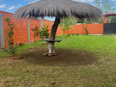 Casa de Campo com Piscina e Churrasqueira à Venda no Centro de Pirayú 4