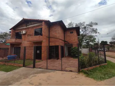 House and two paired duplexes for sale in Luque 4