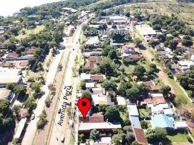 Casa e espaço comercial à venda em Don Bosco 4
