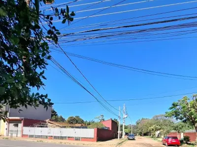 Propriedade à venda com duas casas e salão em Luque 2