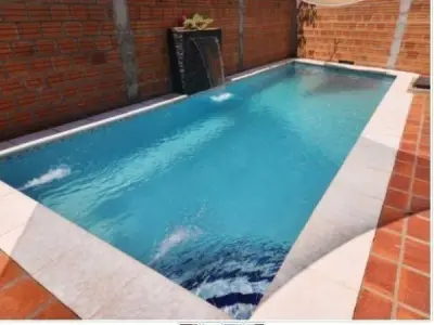 Terreno amurallado con piscina y quincho en Villa Elisa 4