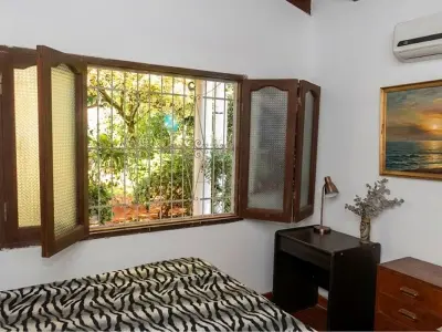Terreno com casa para reformar à venda em Ñemby 3