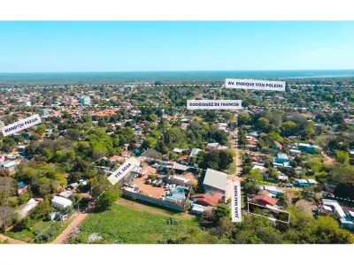 Terreno com casa para reformar à venda em Villa Elisa 4