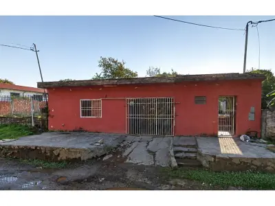 Terreno com casa à venda em Mariano Roque Alonso 2