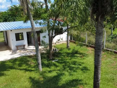 Terreno com construção à venda em Itapuami, Luque 4