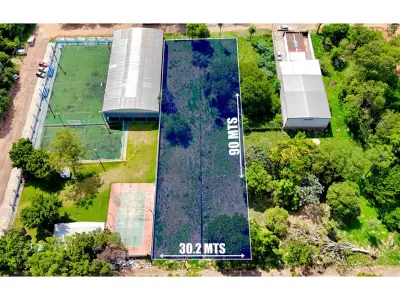 Terreno de 2.719 m² de rua a rua à venda na Zona Norte 2