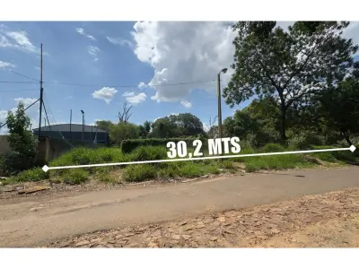 Terreno de 2.719 m² de rua a rua à venda na Zona Norte 4