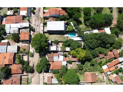 Terreno à venda com casa para demolir em Lambaré 3