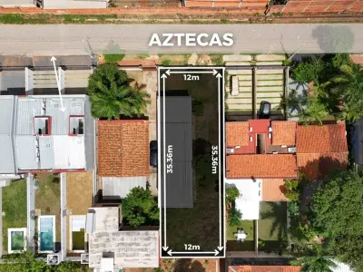 Terreno à venda com casa para reformar em Luque 2